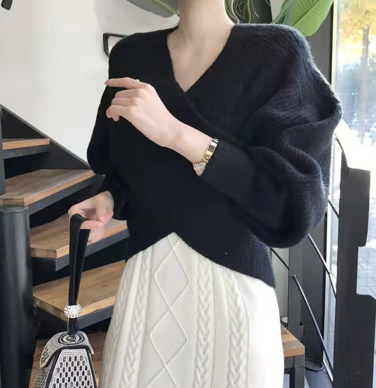 ByMoire. Elegante kruisgebreide trui