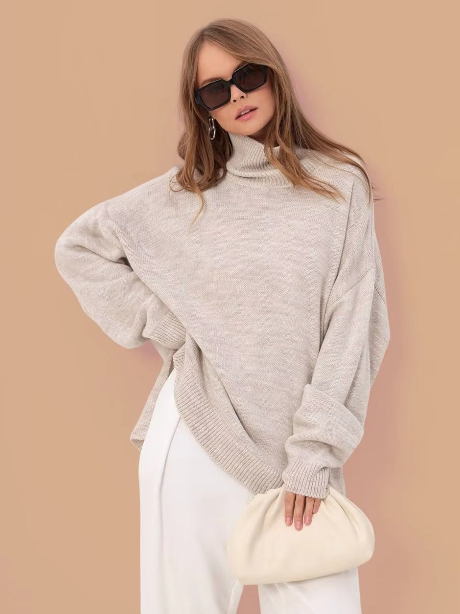 ByMoire. Oversized Trui met Split