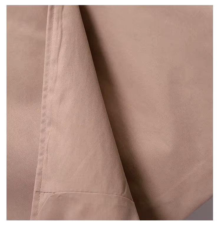 ByMoire. De Tijdloze Trenchcoat die Élke Outfit Upgrade