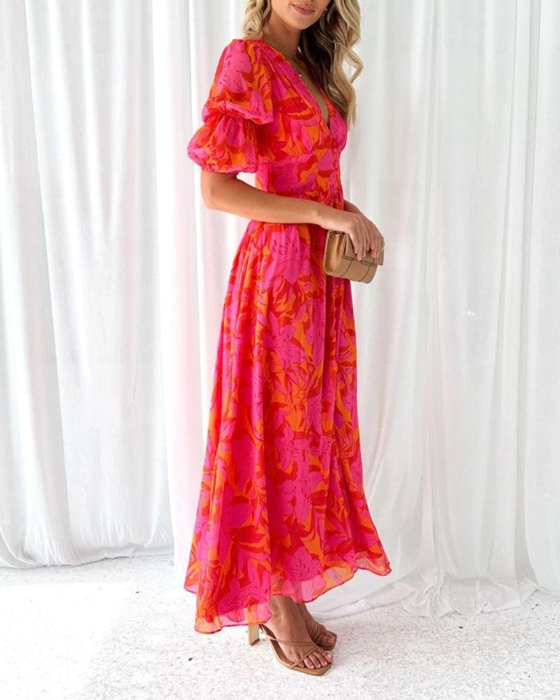 ByMoire. Elegante V-hals Maxi jurk met pofmouwen